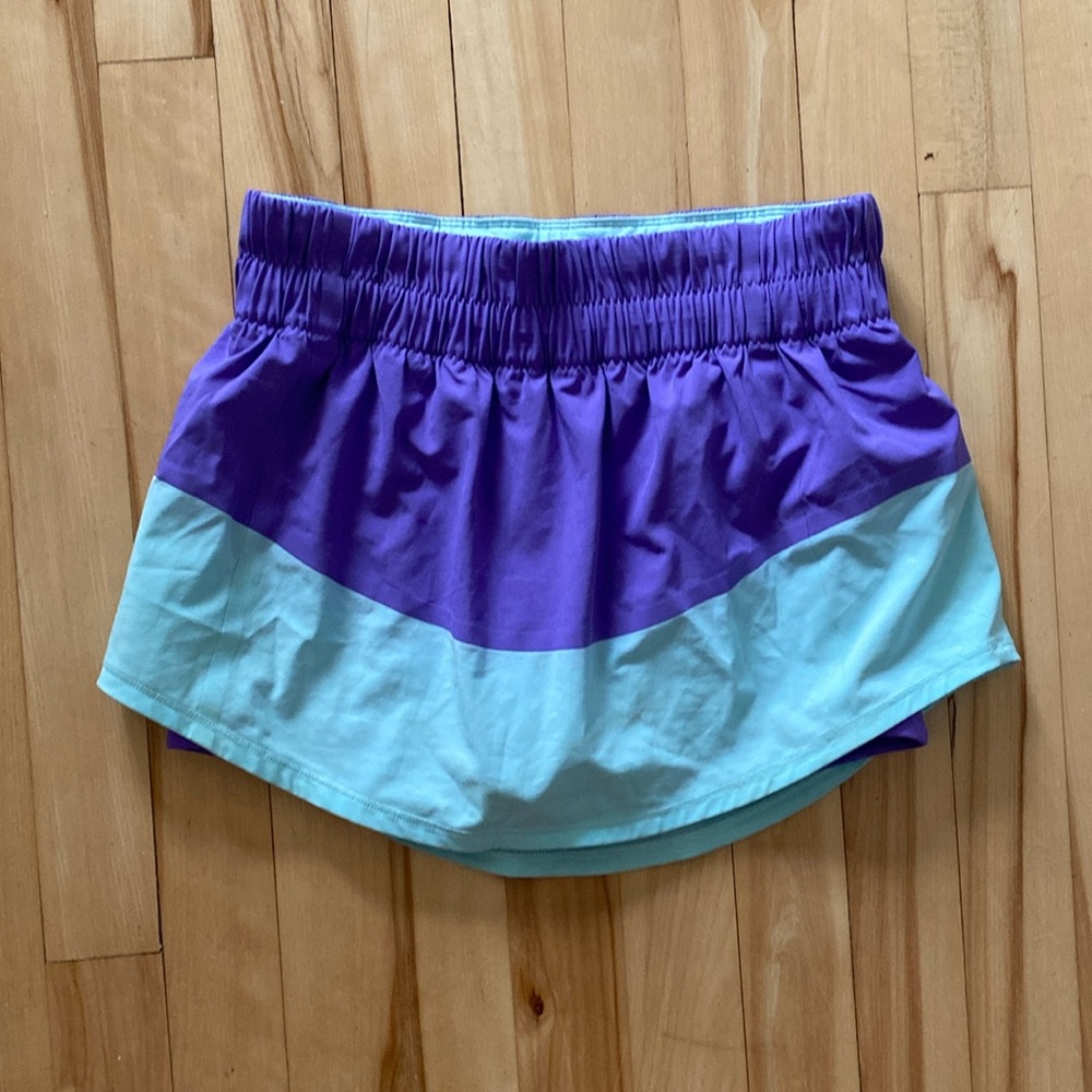 Lululemon run: breeze by skort size 4 purple and blue